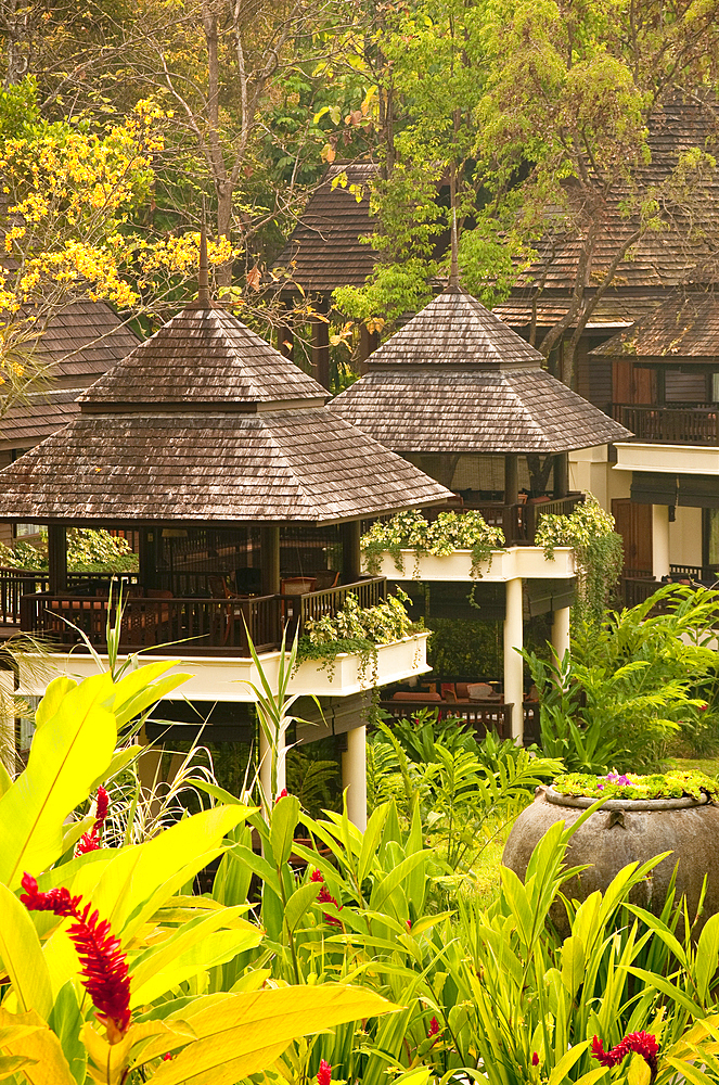 Four Seasons Resort guest rooms and gardens in Chiang Mai, Thailand.