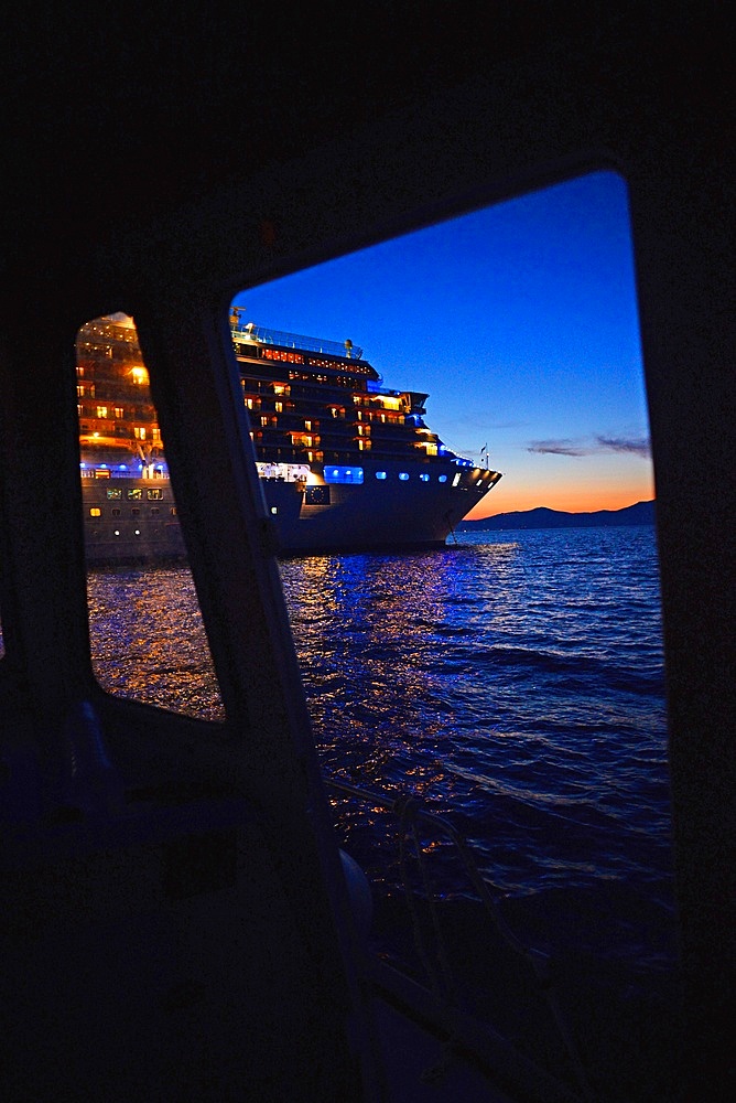 Boat that carries tourists from port of Mykonos to cruise ship, Greek Islands, Greece