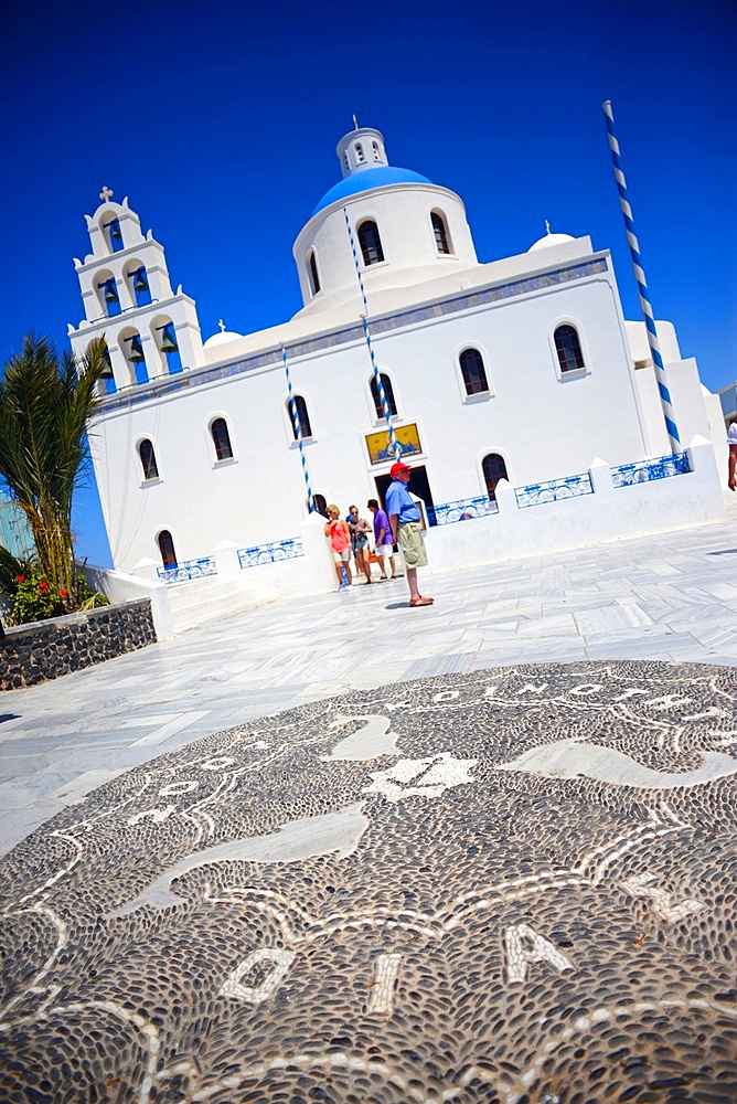 Oia Main Square, also known as Nicolaou Nomikou Square, with Greek Orthodox Church Panagia of Platsiani, Santorini.