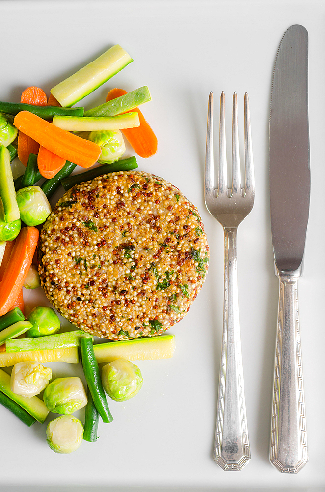 Quinoa burger with cutlery