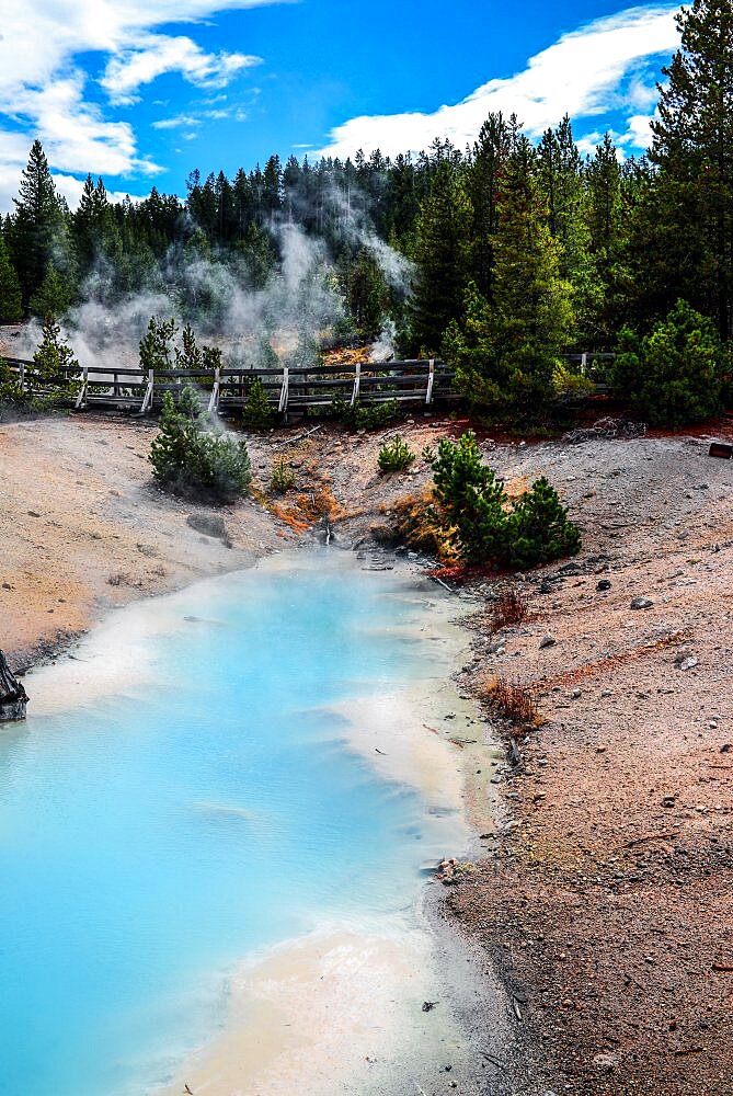 Young woman in Norris Geyser Basin, Yellowstone National Park, USA