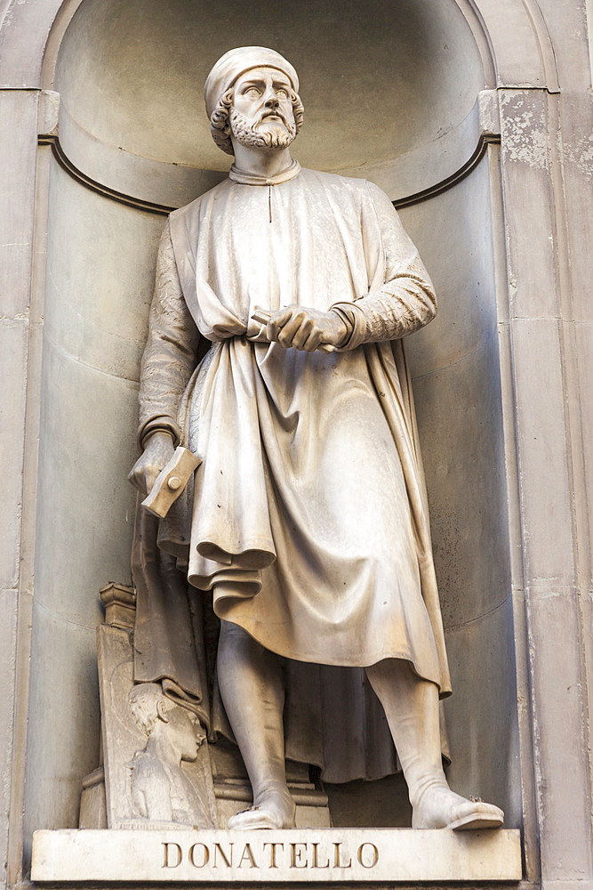 Statue of Donatello, Italian sculptor, in courtyard, Uffizi Gallery Museum, Piazzale Degli Uffizi, Florence, Tuscany, Italy