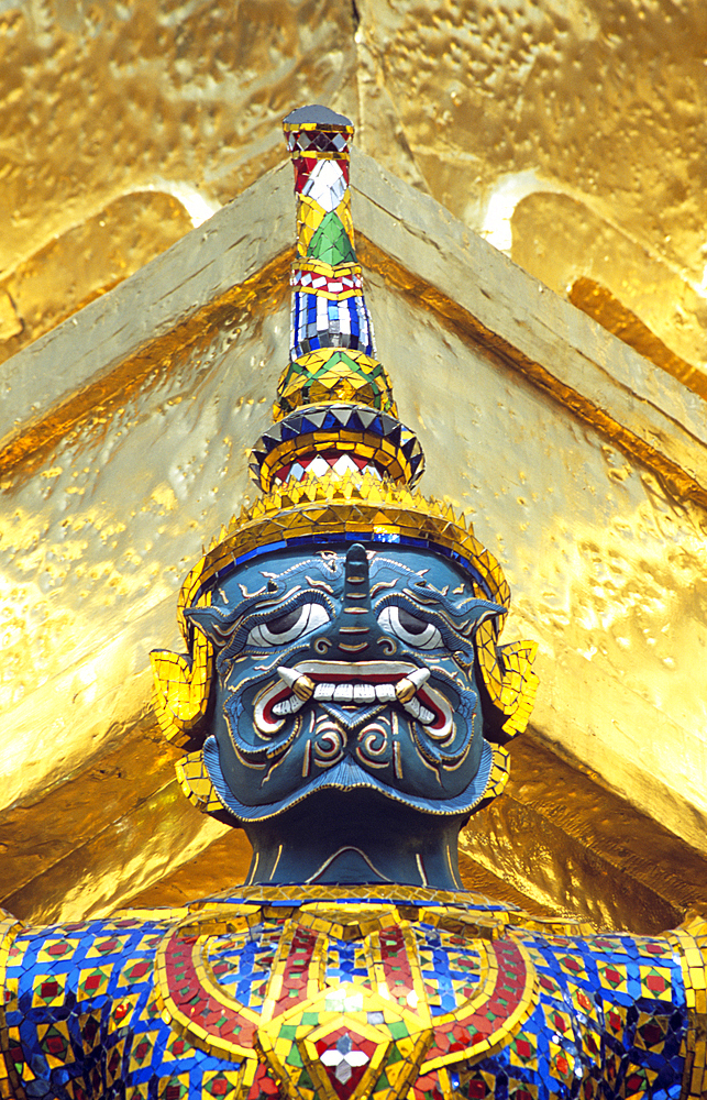 Face of guardian mythical demon figure, Grand Palace, Bangkok, Thailand