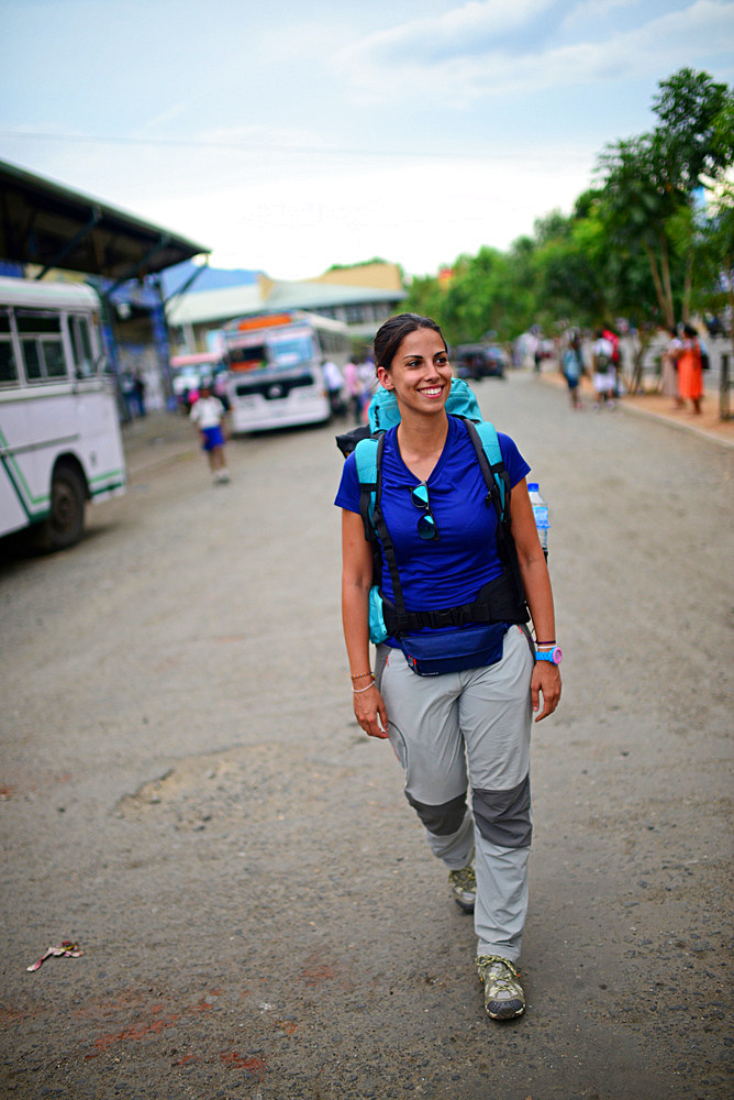 Young attractive female backpacker in Wellawaya bus station, Sri Lanka