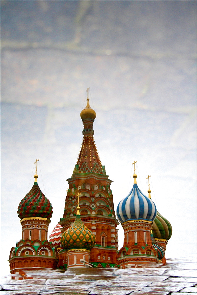 The reflection of St Basil's Cathedral in a puddle, Moscow