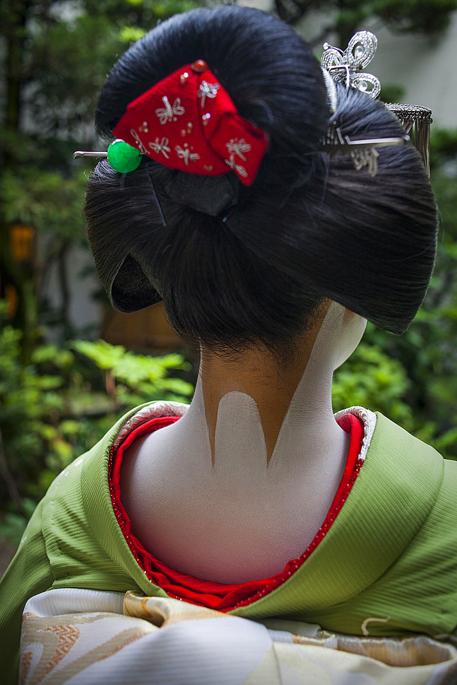 Detail of 'maiko' (geisha apprentice) from Ishihatsu okiya (house of geishas).Geisha's distric of Miyagawacho.Kyoto. Kansai, Japan.