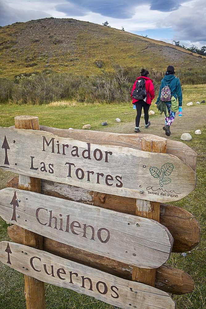 Hikers and signaling in Torres Sector, Torres del Paine national park, Patagonia, Chile