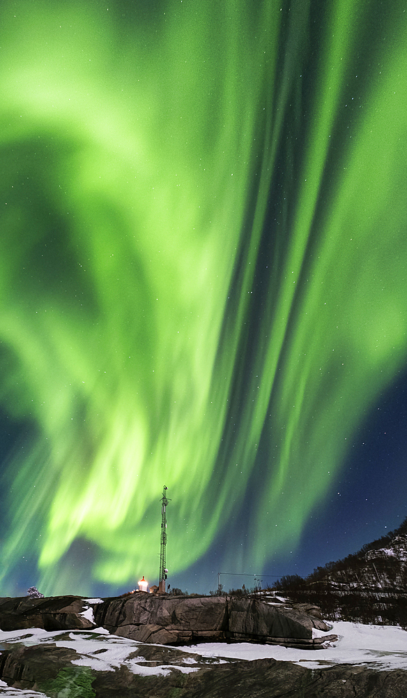 The Aurora Borealis (Northern Lights) over Tungeneset Lighthouse, Tungeneset, Senja, Troms og Finnmark county, Norway, Scandinavia, Europe