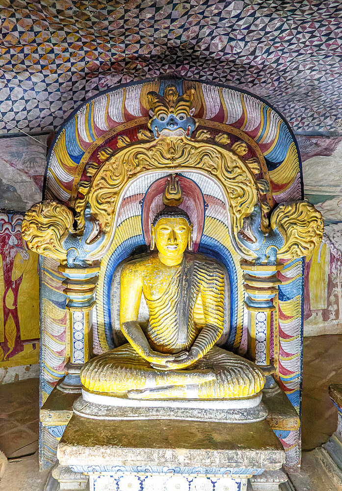 Buddha figure inside Dambulla cave Buddhist temple complex, UNESCO World Heritage Site, Sri Lanka, Asia