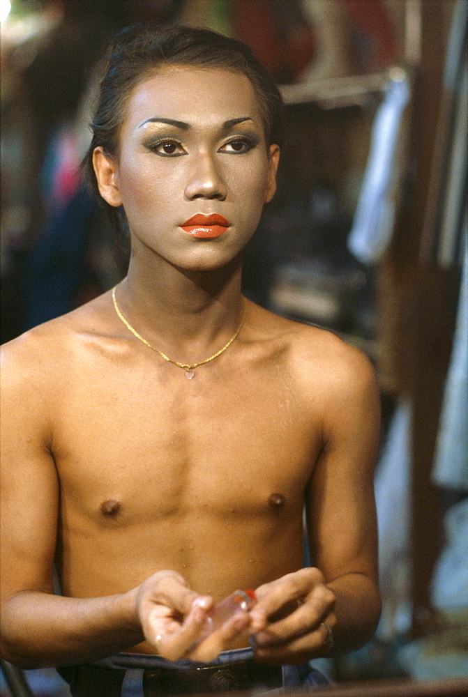 A gay boy preparing backstage for a show at the Rome Club Disco in Patpong in Bangkok, Thailand, Southeast Asia, Asia