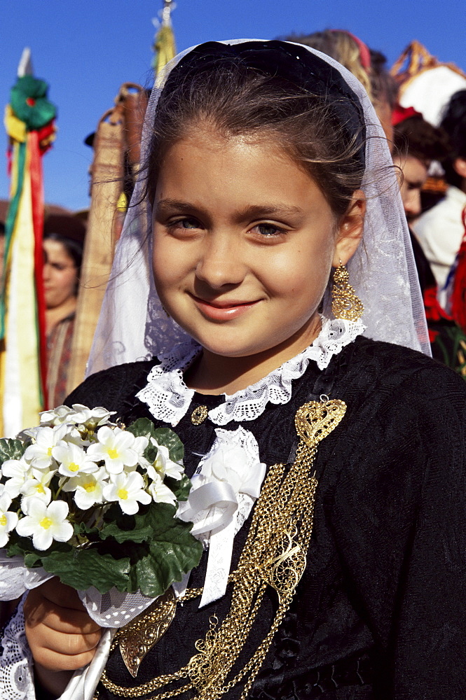 Girl in folkloric costumes, Festa de Santo Antonio (Lisbon Festival), Lisbon, Portugal, Europe