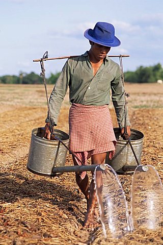 Farmer with watering cans, Cambodia, Indochina, Southeast Asia, Asia