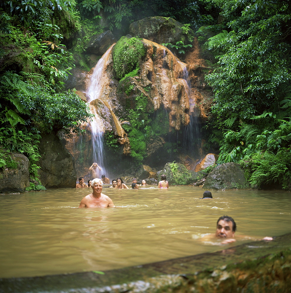 People bathing in volcanic pool, island of Sao Miguel, Azores, Portugal, Europe