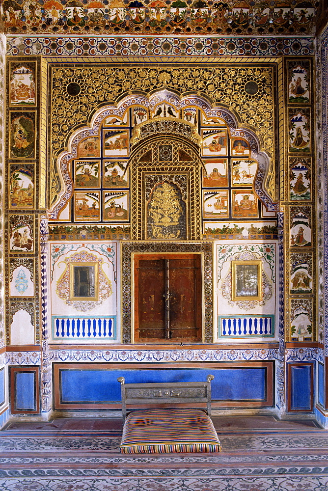 Painted wall and raised plaster work which has been gilded, Mehrangarh Fort, Jodhpur, Rajasthan state, India, Asia