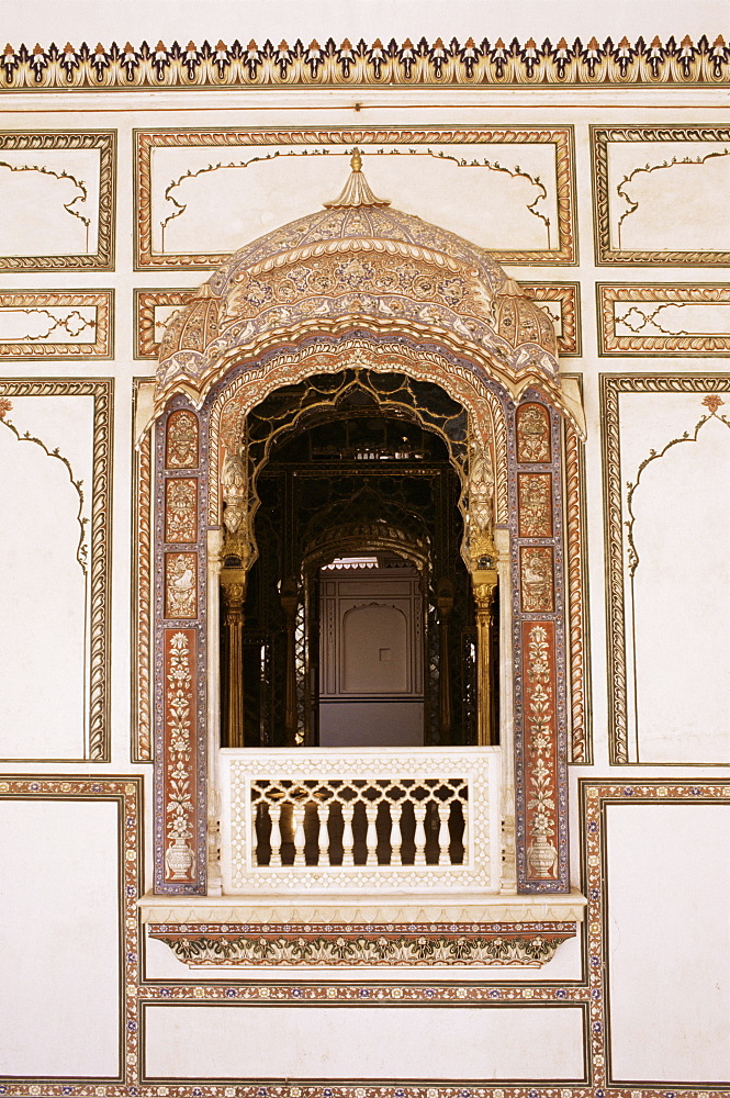 The intricately painted jharoka (balcony) is a traditional architectural feature in Rajput forts, Kuchaman Fort, Kuchaman, Rajasthan state, India, Asia