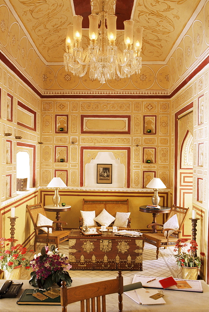 Reception area for arriving guests with reproduction colonial style furniture, painted walls and ceiling, Samode Palace Hotel, Samode, Rajasthan state, India, Asia