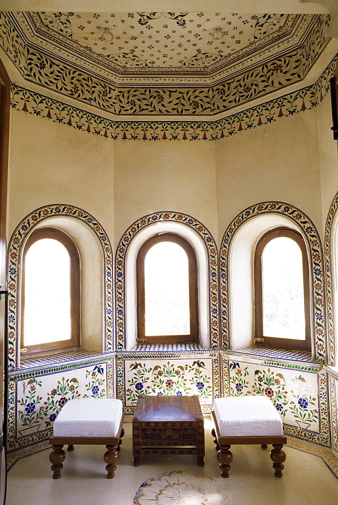 Coloured glass work inlaid into plaster in seating area of bedroom suite, Devi Garh Fort Palace Hotel, near Udaipur, Rajasthan state, India, Asia