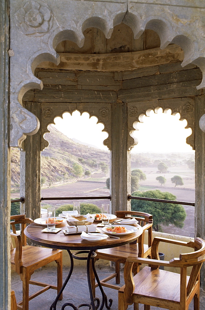 Private exterior dining area ajoining a bedroom suite, Devi Garh Fort Palace Hotel, near Udaipur, Rajasthan state, India, Asia