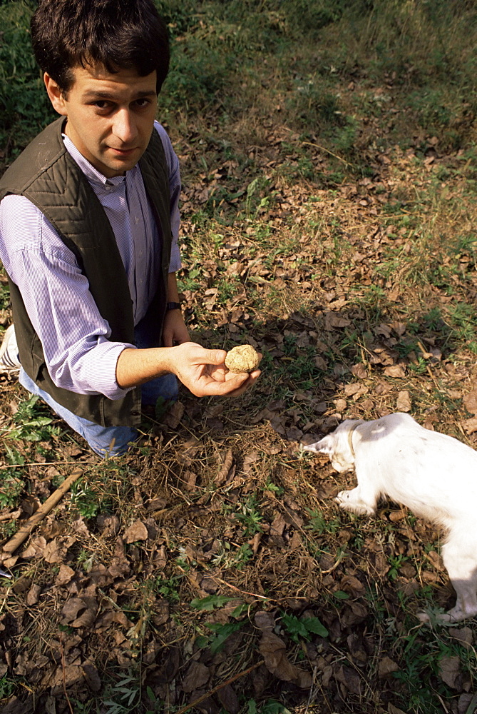 Paulo Cerutti with truffle and Diana the dog, Monta d'Alba, Barolo, Piemonte (Piedmont), Italy, Europe