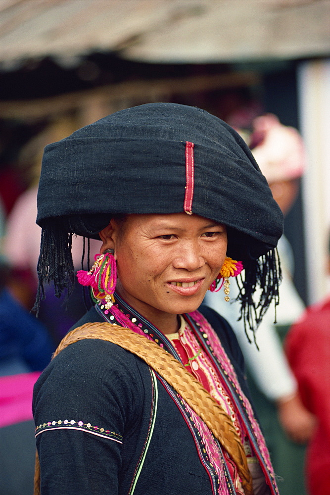 Portrait of a Blang woman in traditional dress at Menghai, Yunnan Province, China, Asia