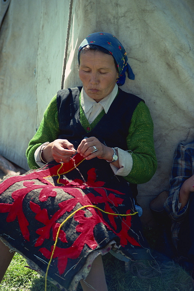 Kazak woman making felts, Tienshan, Xinjiang, China, Asia