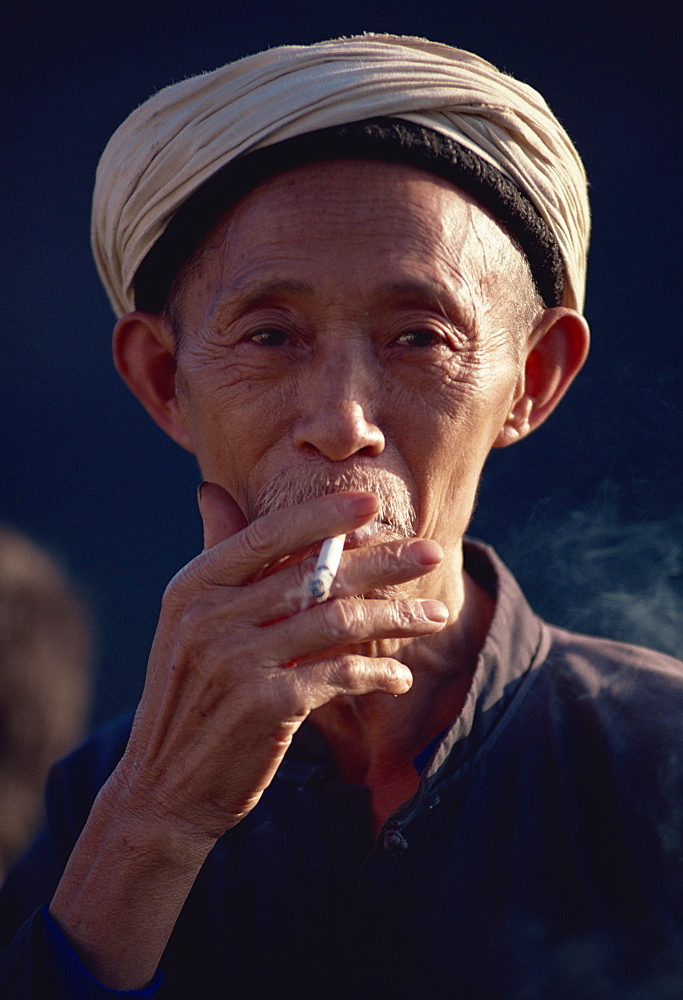 Man with traditional white headdress, Sichuan, China, Asia