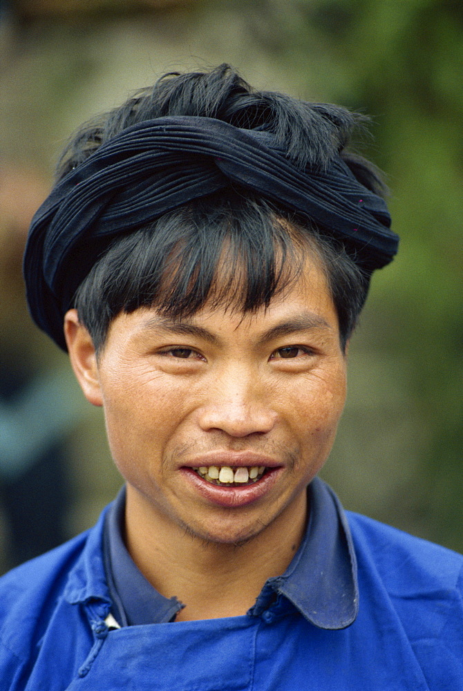 Portrait of young Miao man, Guizhou Province, China