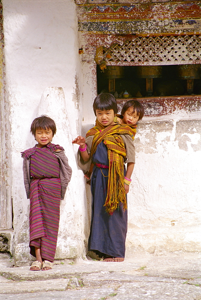 Portrait of three children in east Bhutan, Asia