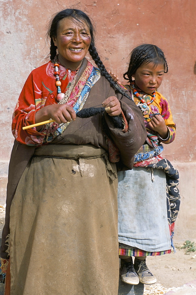 Tibetan woman spinning, Qinghai Province, China, Asia