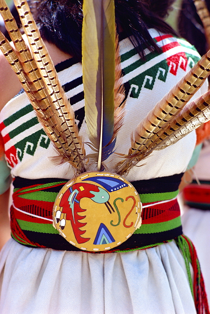 Close-up of the belt and feathers from the costume of an Indian Buffalo Dancer, San Juan, New Mexico, United States of America, North America