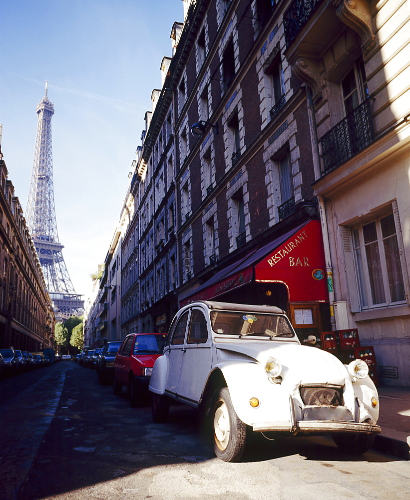 Parked Citroen on Rue de Monttessuy, with the Eiffel Tower behind, Paris, France 