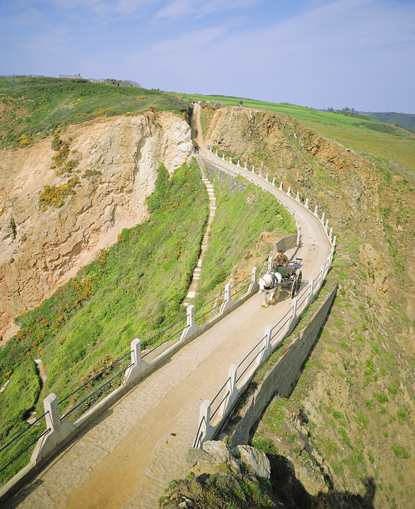 La Coupee and carriage transport, view north from Little Sark to Sark, Channel Islands, UK, Europe