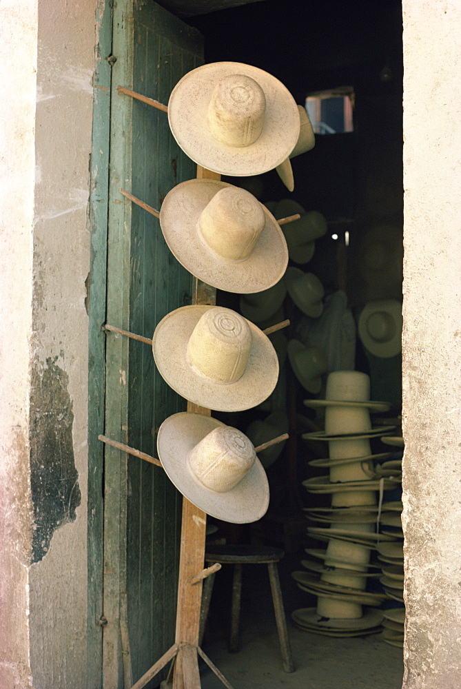 Hats for sale, diplayed on stand outside shop, near Cochabamba, Bolivia, South America