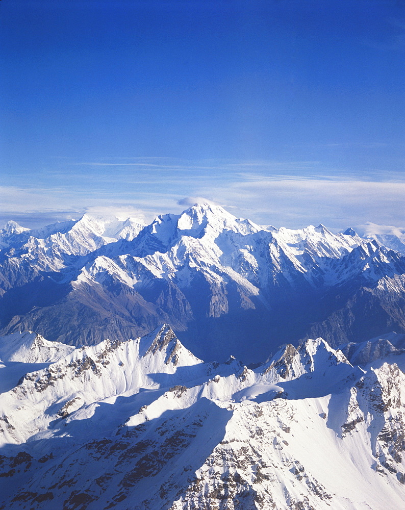 The snow capped peaks of the Karakoram mountains in Pakistan, Asia