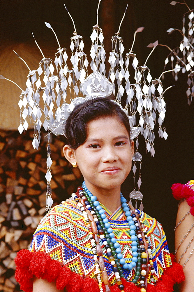 Head and shoulders portrait of an Iban girl, Sarawak, island of Borneo, Malaysia, Southeast Asia, Asia