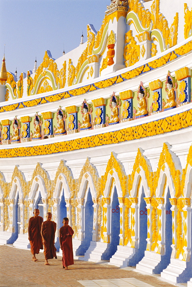 Three Buddhist monks at Onhmin Thonze monastery, Sagaing, Myanmar (Burma), Asia