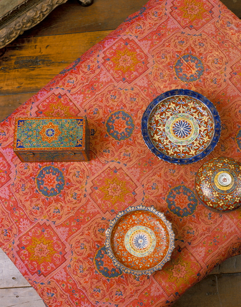 Overhead view of Bencharong ceramics and silk designed by Jim Thompson, Jim Thompson's House, Bangkok, Thailand, Southeast Asia, Asia