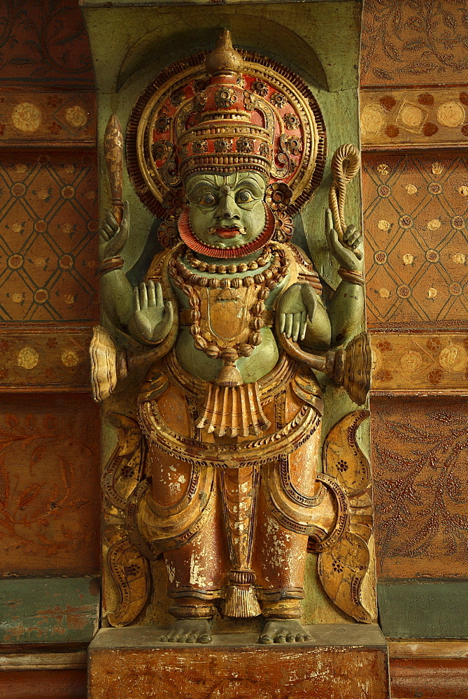 Detail of wooden carving at Kalari Kovilakom, Kerala, India, Asia