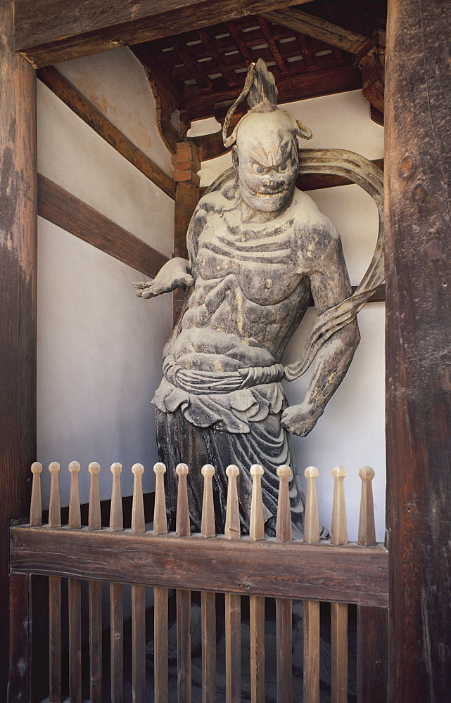 Guardian figure at Horyuji Temple, which contains the world's oldest wooden structures, Nara, Japan, Asia