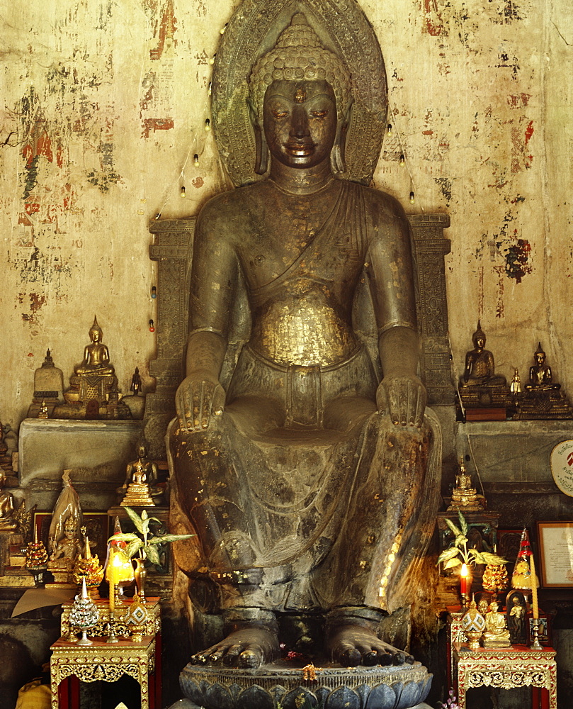 Stone image of Buddha sitting in Western fashion from Dvaravati Period, Wat Na Phra Men, Ayutthaya, Thailand, Southeast Asia, Asia