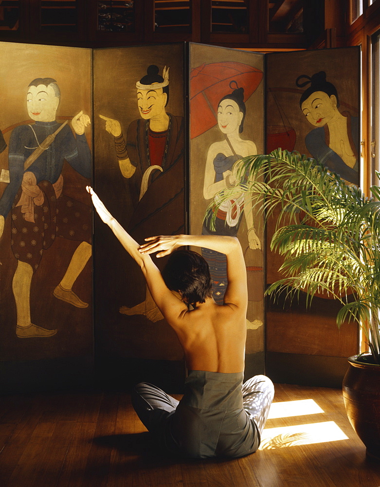 Girl doing Yoga at the Oriental Spa, Bangkok, Thailand, Southeast Asia, Asia