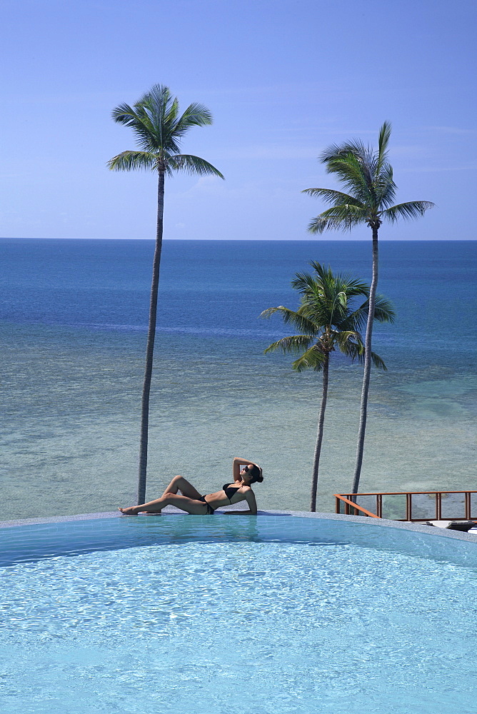 Girl at the pool at Sasha Resort in Koh Samui, Thailand, Southeast Asia, Asia