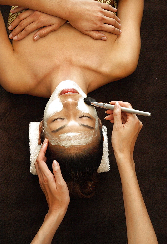 Application of facial mask for facial treatment