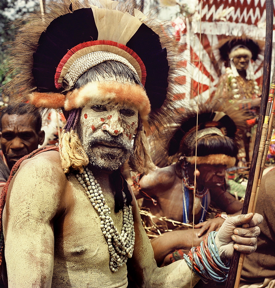 Asaro tribesmen photographed in 1974 in full costume for a rital display of wealth, Goroka, Papua New Guinea, Pacific