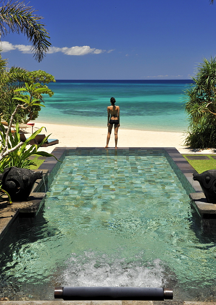 Girl at the pool at Shangri La Boracay Resort and Spa in Boracay, Philippines, Southeast Asia, Asia