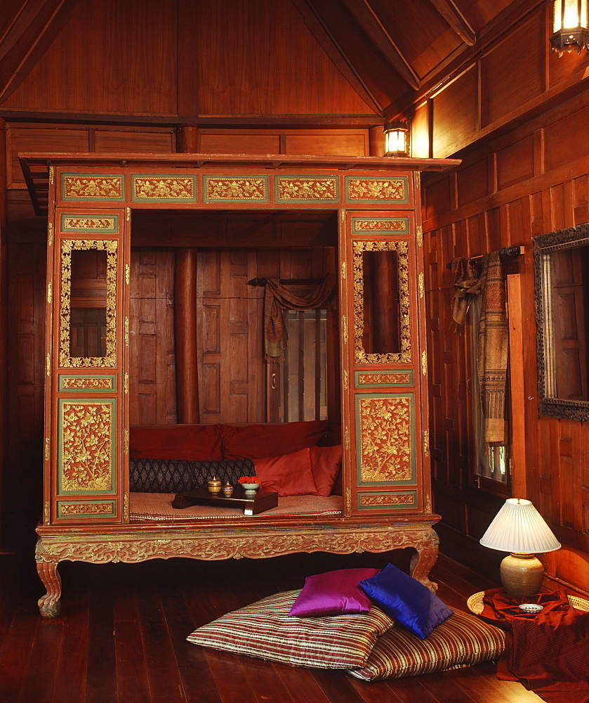 Interior of a Thai style home with a Thai-Chinese bed, Thailand, Southeast Asia, Asia