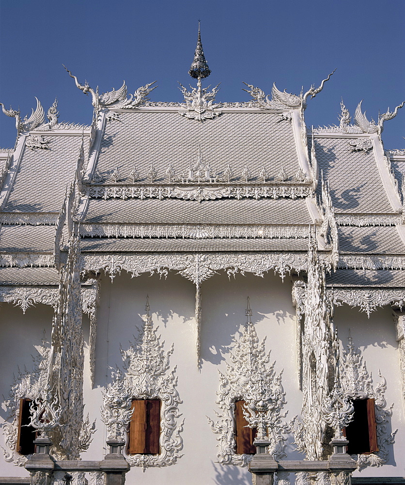 Modern Buddhist temple, designed and painted by noted artist Chalermchai Kositpipat, Wat Rong Khun, Chiang Rai, Northern Thailand, Thailand, Southeast Asia, Asia