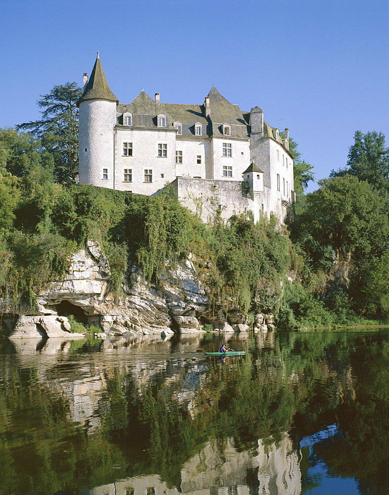 La Treyne Chateau, reflected in the water of the River Dordogne, Aquitaine, France, Europe