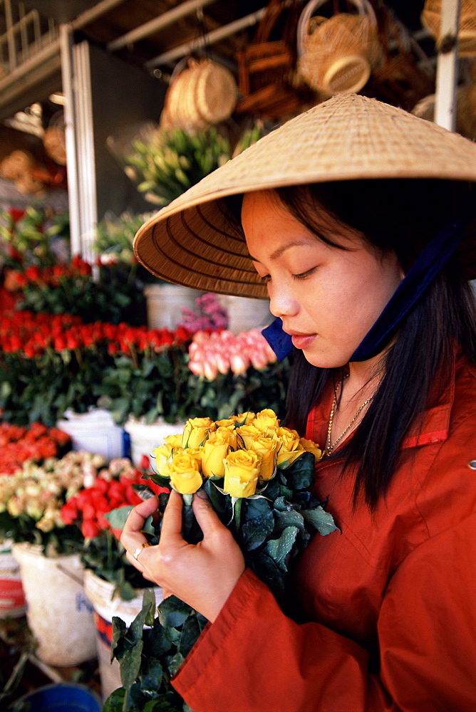 Portrait of a young woman selling roses, Dalat, Central Highlands, Vietnam, Indochina, Southeast Asia, Asia