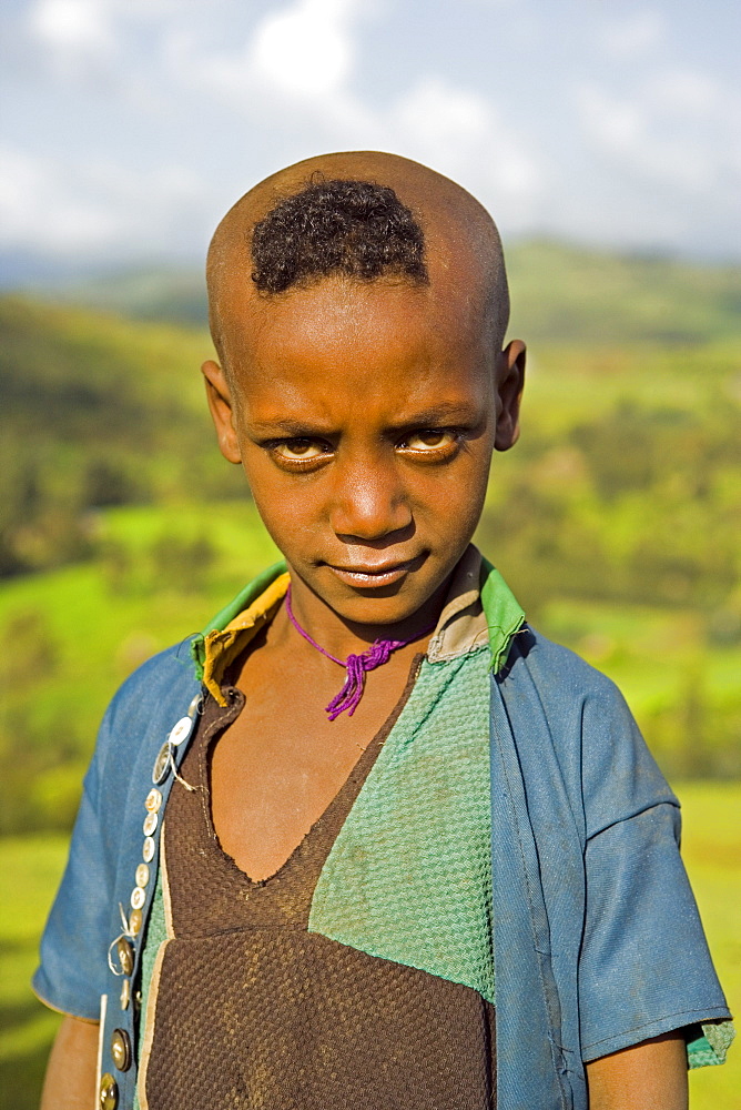 Portait of a local village boy, Simien Mountains National Park, The Ethiopian Highlands, Ethiopia, Africa